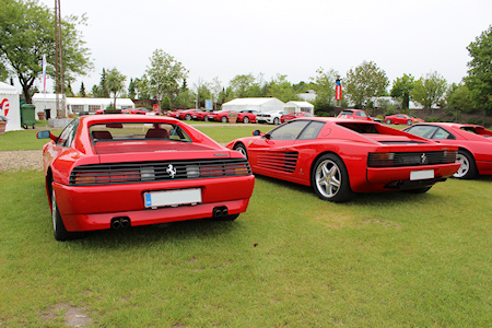 Ferrari 348 next to a Ferrari Testarossa